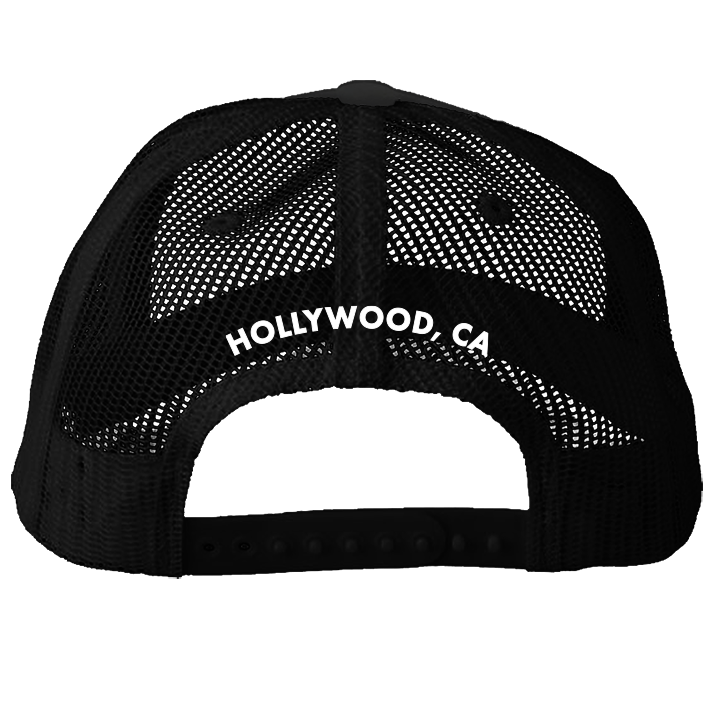 Black trucker hat with 'PINK'S' in pink and 'HOLLYWOOD, CA' on the mesh back.